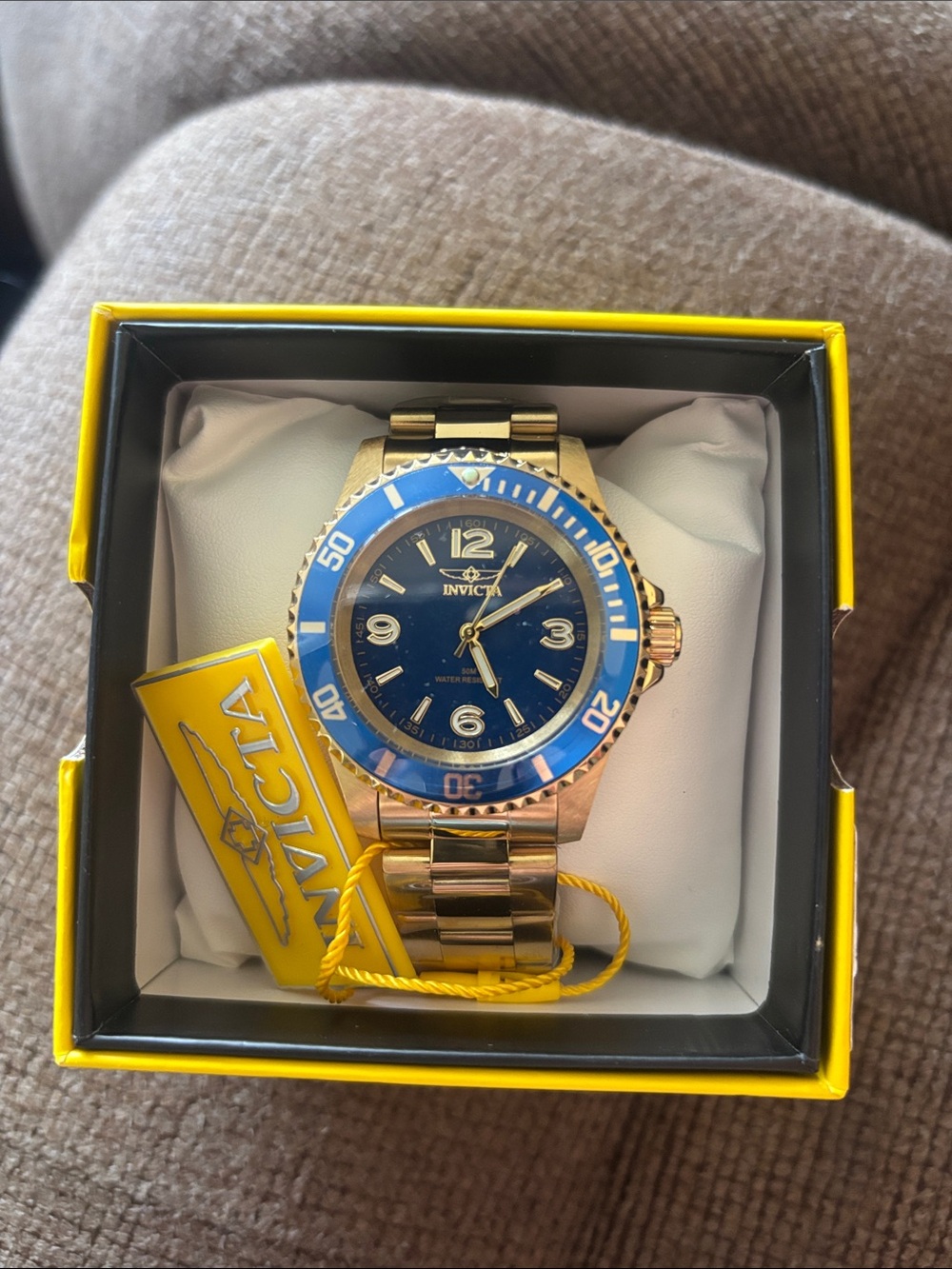 Invicta Gold Tone Watch with Blue Dial and Bezel